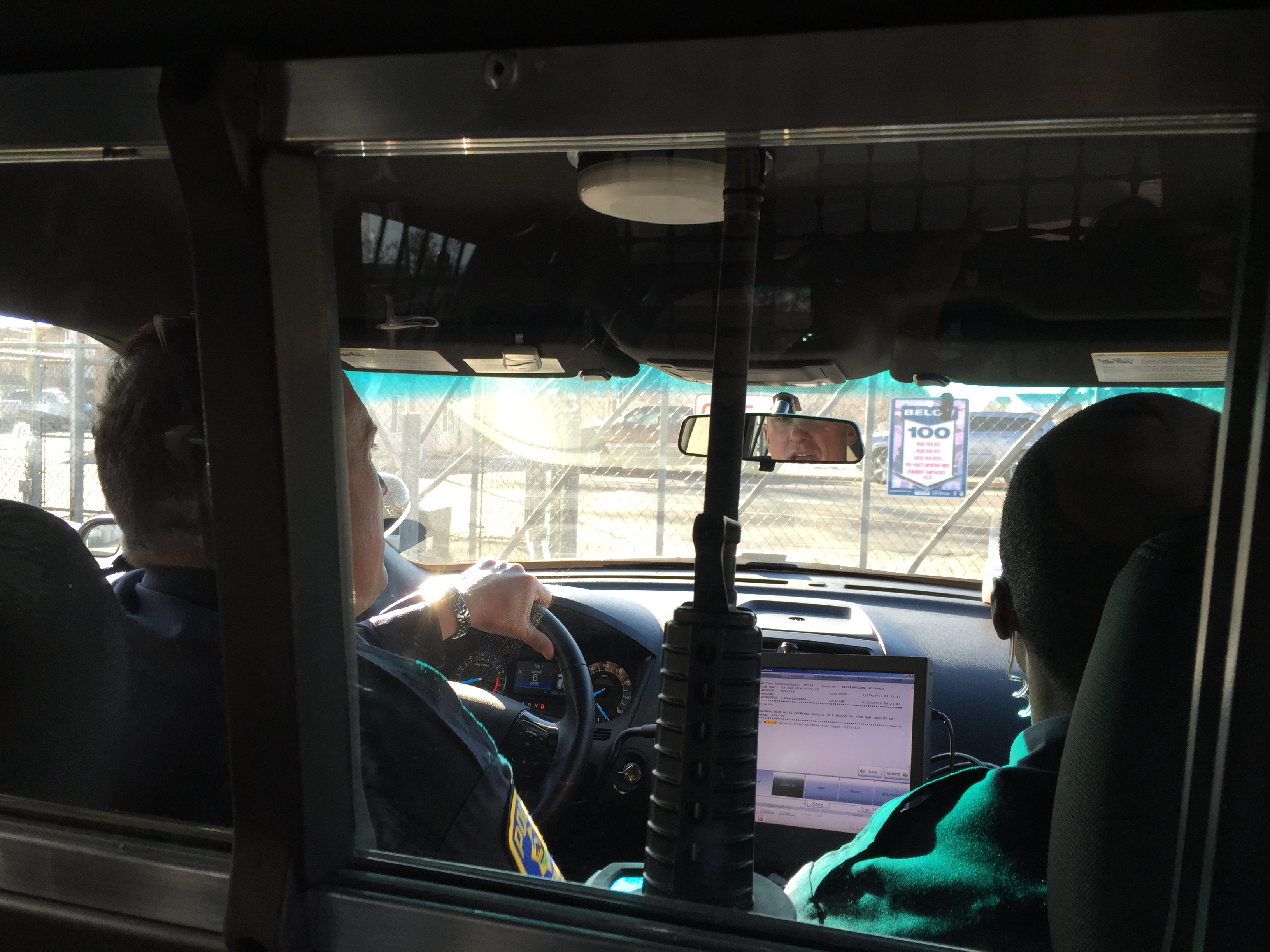 Officers in squad car